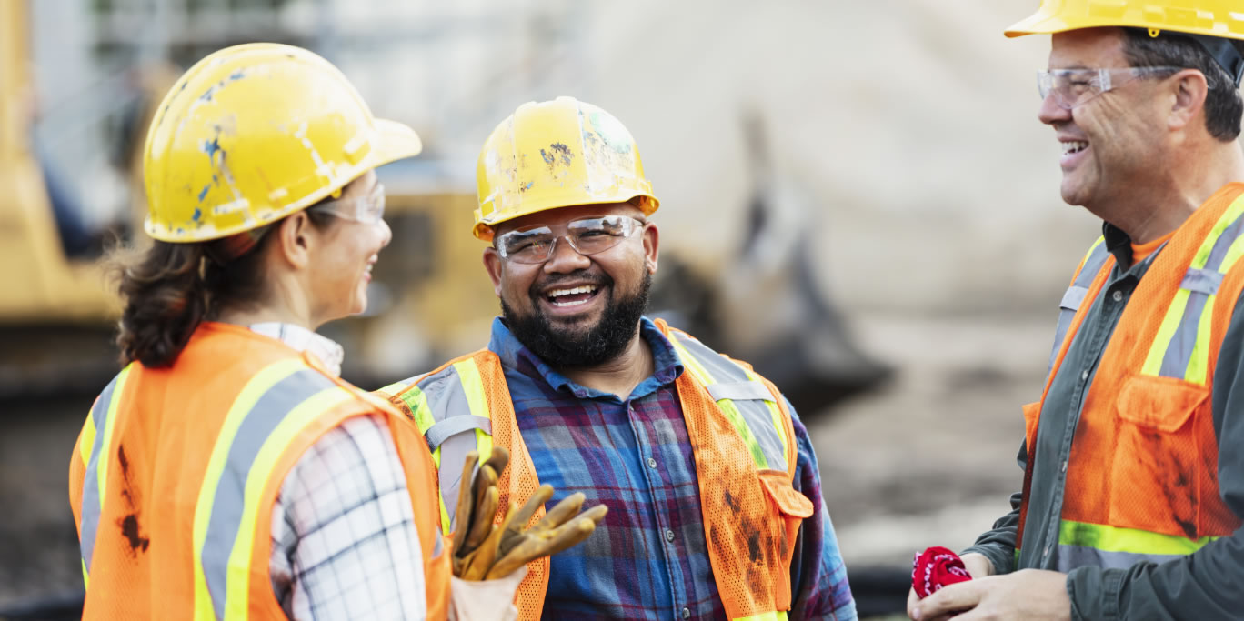 Construction workers laughing